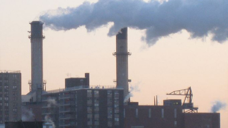 Smoke being emitted from a power plant